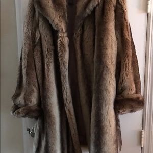 Like new Faux fur coat. Below knee. Worn twice. Cute!